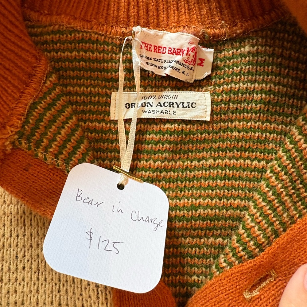 Vintage Knit Sweater with Green Figures and Orange Accents - Picture 2 of 3